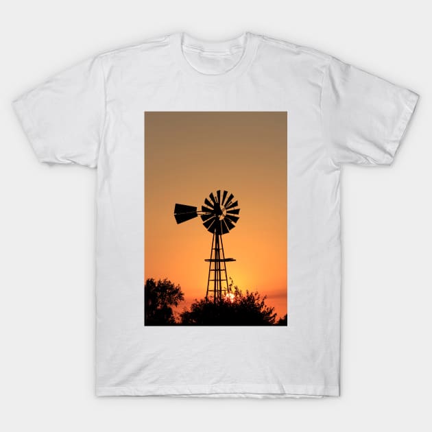 Kansas Golden Sunset with a Windmill silhouette. T-Shirt by ROBERTDBROZEK